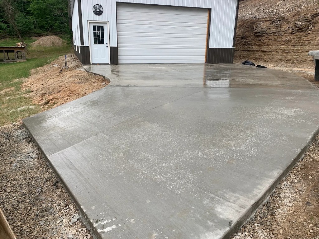 Concrete apron poured in front of a metal shop building